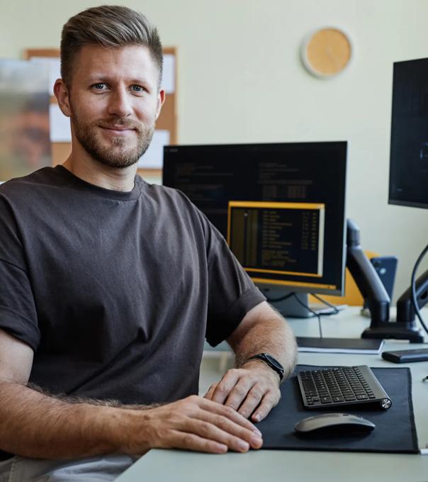 Adult male student sitting at a computer