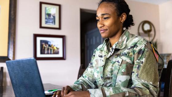 Military service member at computer searching ODUGlobal programs