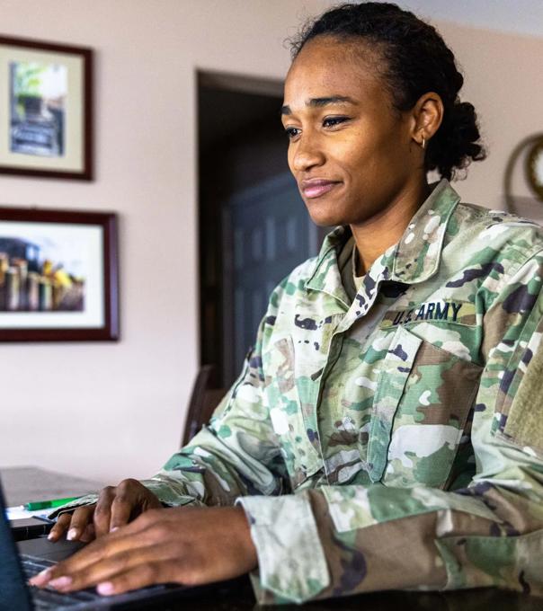 Military service member at computer searching ODUGlobal programs