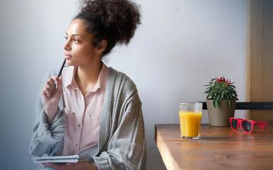 Female student sitting at a table