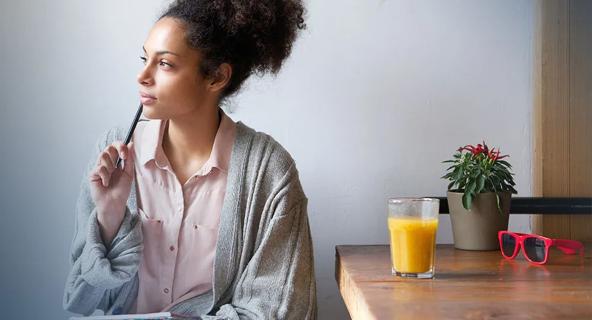 Female student sitting at a table