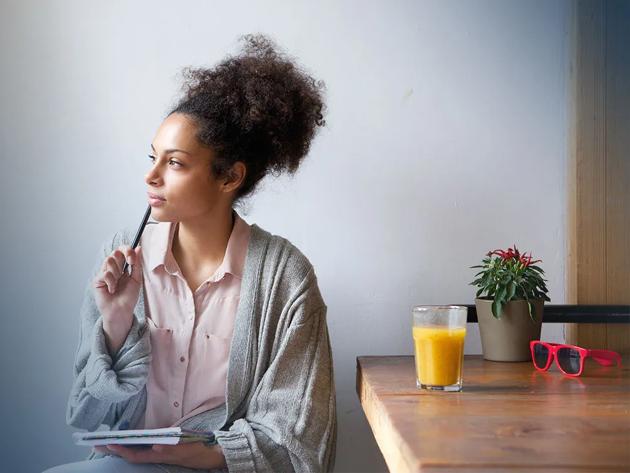 Female student sitting at a table