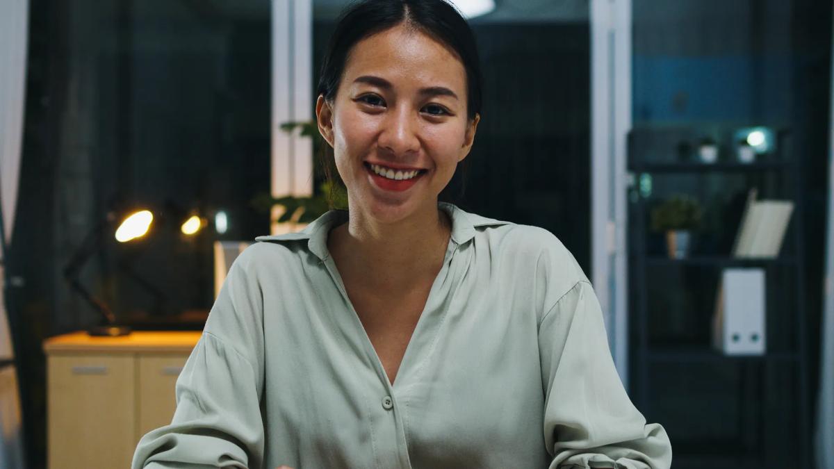 Women smiling warmly at the camera.