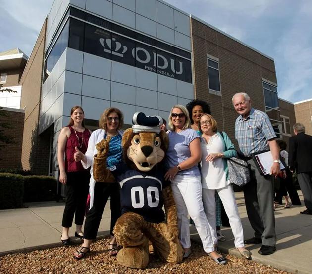Big Blue and staff outside the ODU Tri-Cities Higher Education Center