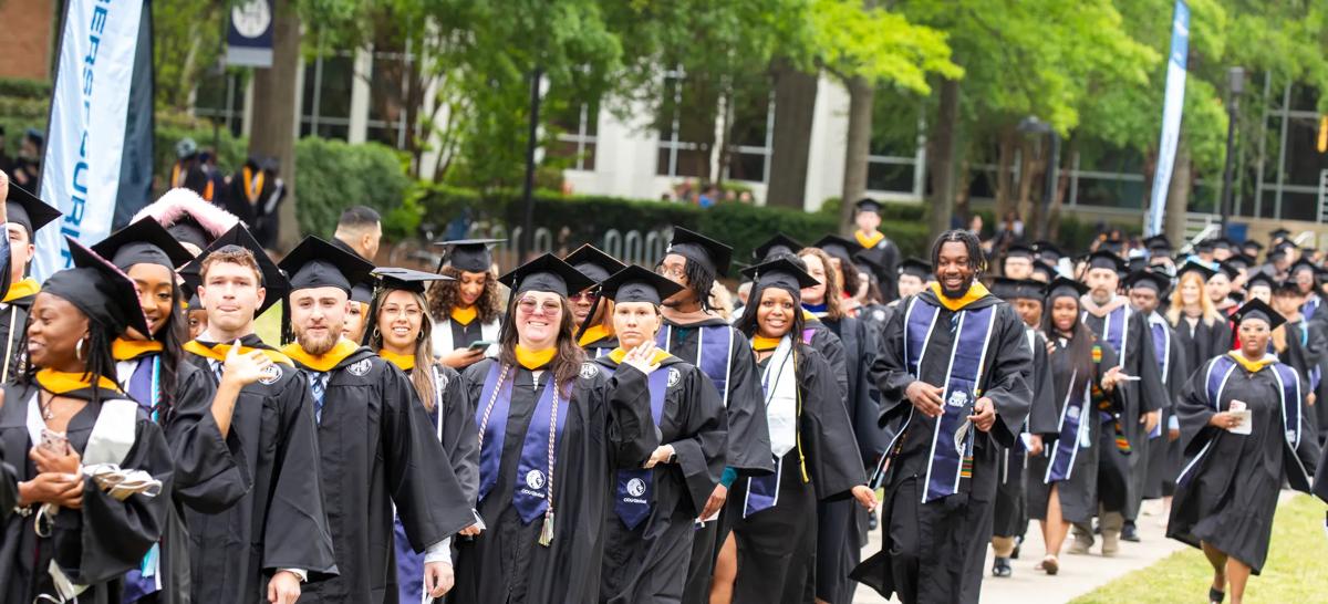 A group of graduates lines up to walk during the ceremony at ODU's commencement.