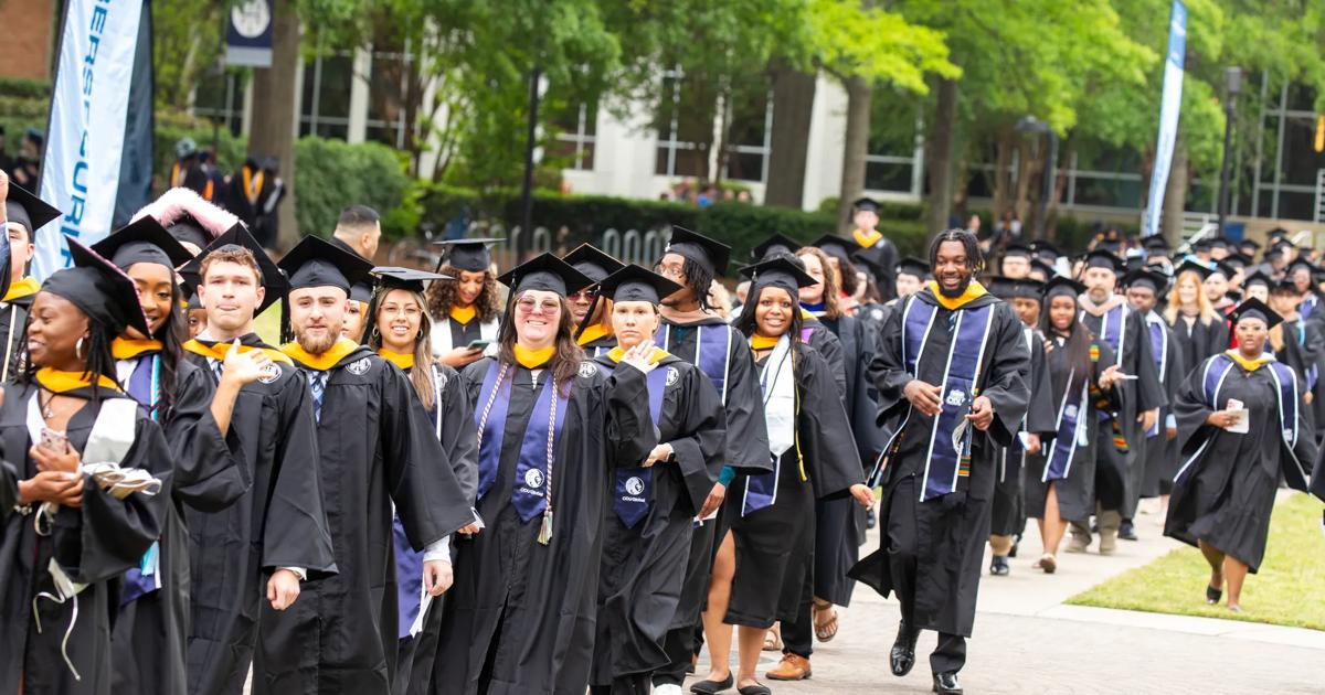 A group of graduates lines up to walk during the ceremony at ODU's commencement.