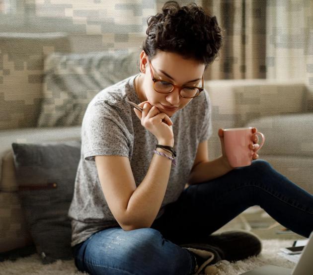 woman studying online with military background