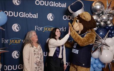 Taylor Ripley celebrates with her mom and Big Blue at the ODUGlobal graduation reception.
