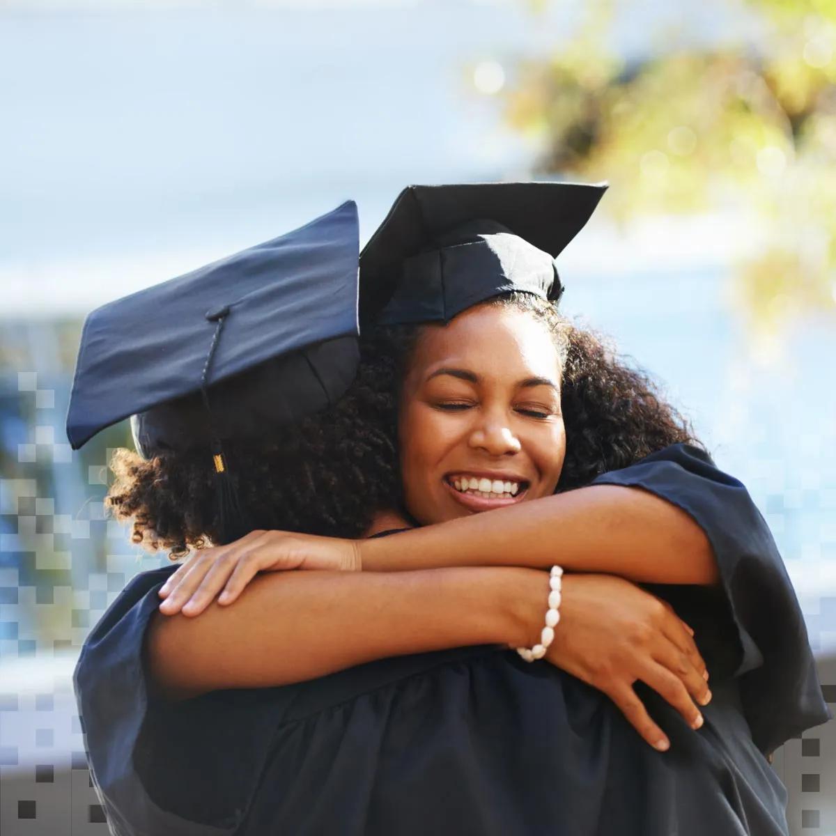 Graduate student wearing a cap and gown during commencement.