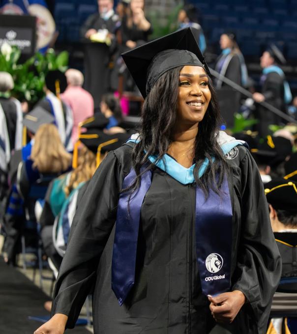 A graduating ODUGlobal student at commencement