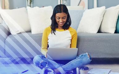 Woman attending classes online on a laptop