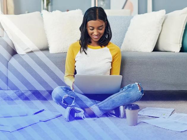 Woman attending classes online on a laptop