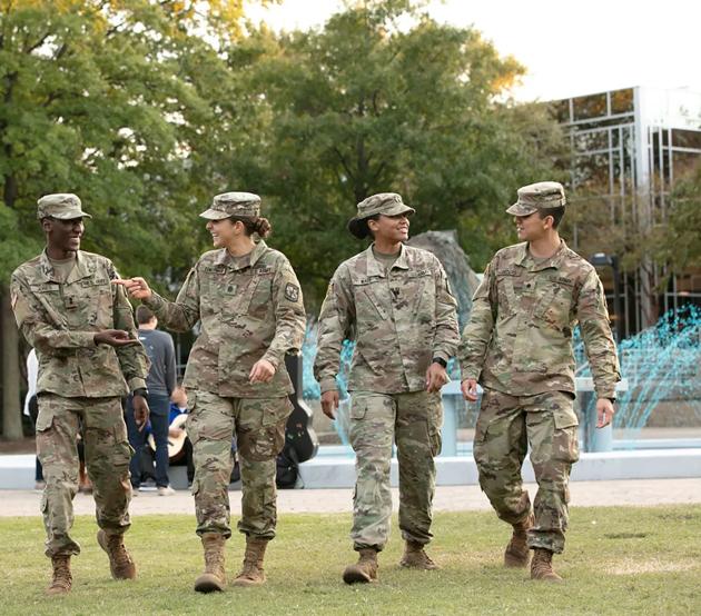 Military members walking on campus talking about how to transfer military credits to ODUGlobal