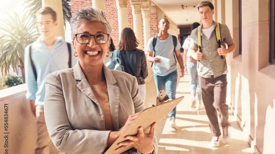 Female professional working confidently across campus.