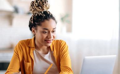 Student working at home on a laptop