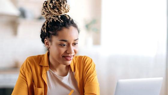 Student working at home on a laptop