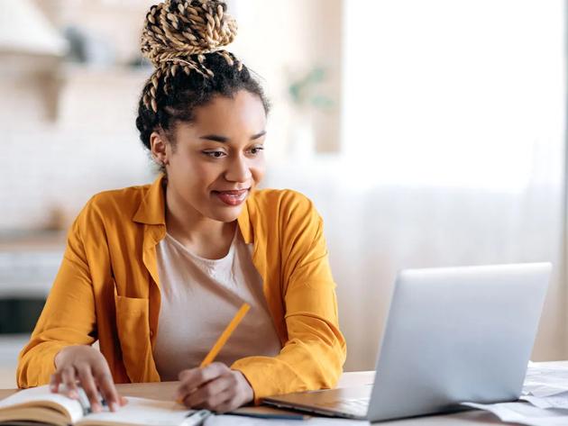 Student working at home on a laptop