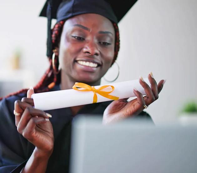 Woman holding her diploma