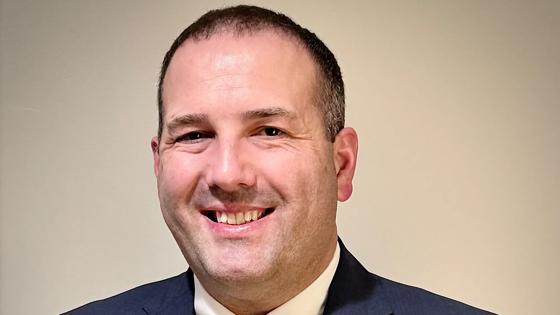 Jay Belknap, associate engineer at Mecklenburg Electric Cooperative and ODU electrical engineering technology student, is helping his rural Virginia utility integrate large-scale data centers into a power grid built for farms and sawmills. 